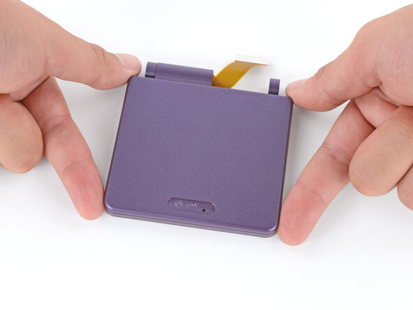 How to Reshell Your Game Boy Advance SP, Flip the shells over: crwdns2935265:039crwdnd2935265:01crwdnd2935265:02crwdne2935265:0