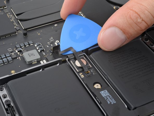 MacBook Pro 14" Late 2023 (M3) USB-C Ports Replacement, Separate the battery data cable adhesive: crwdns2935265:018crwdnd2935265:02crwdnd2935265:03crwdne2935265:0