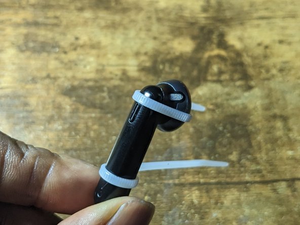 Jbl Tune 225TWS Battery Replacement, Reinstall battery cover 2: crwdns2935265:07crwdnd2935265:02crwdnd2935265:02crwdne2935265:0