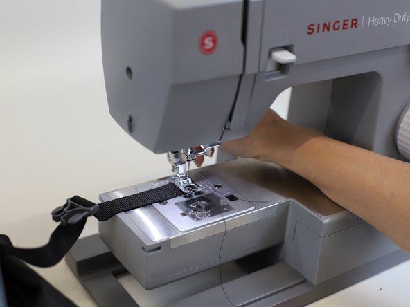 How to Replace a Backpack Buckle (with sewing), Stitch the top buckle piece: crwdns2935265:05crwdnd2935265:03crwdnd2935265:03crwdne2935265:0