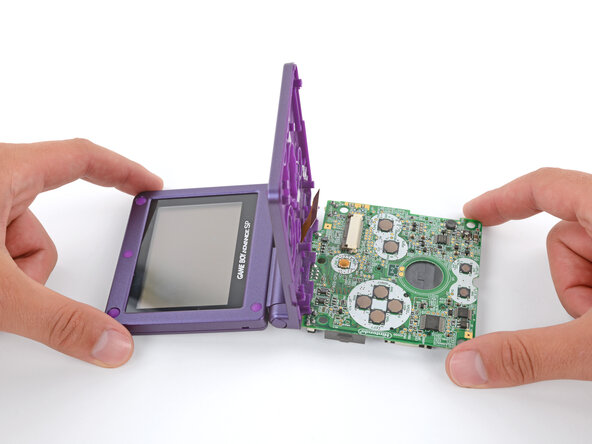 How to Reshell Your Game Boy Advance SP, Prop up the main body: crwdns2935265:052crwdnd2935265:02crwdnd2935265:03crwdne2935265:0