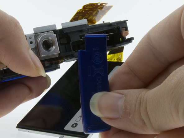 Canon PowerShot ELPH 150 IS Card/Battery Door Replacement: crwdns2935265:05crwdnd2935265:03crwdnd2935265:03crwdne2935265:0