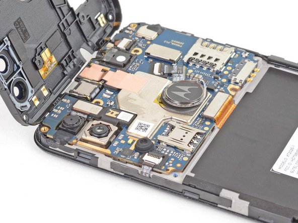 Motorola Moto E6 Plus Motherboard Replacement, Remove the motherboard cover: crwdns2935265:016crwdnd2935265:03crwdnd2935265:03crwdne2935265:0