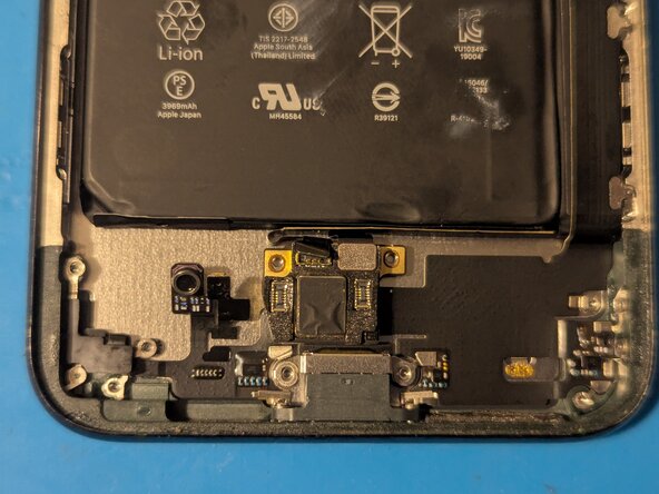 iPhone 11 Pro Max Lightning Connector Assembly Replacement, Remove the Lightning connector screws: step 47, image 2 of 2