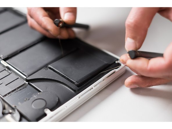 Battery and Trackpad. Disassembling MacBook Pro 15" Retina 2012-2015: crwdns2935265:06crwdnd2935265:03crwdnd2935265:03crwdne2935265:0