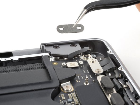 MacBook Pro 14" Late 2023 (M3) Screen Replacement, Remove the lid angle sensor connector cover: crwdns2935265:033crwdnd2935265:03crwdnd2935265:03crwdne2935265:0