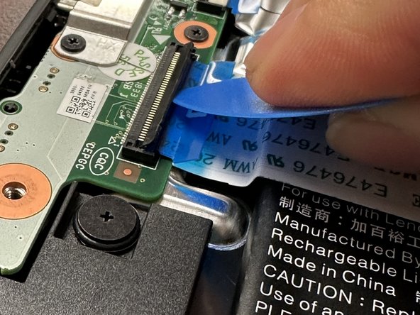 Lenovo 100e Chromebook Display Removal, Disconnect Ribbon Cable: crwdns2935265:04crwdnd2935265:02crwdnd2935265:03crwdne2935265:0
