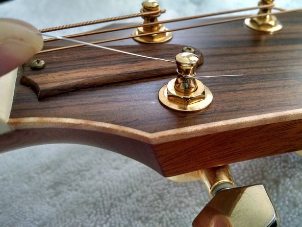 How to clean and maintain your Taylor 816CE, Install first three new strings: crwdns2935265:03crwdnd2935265:03crwdnd2935265:03crwdne2935265:0