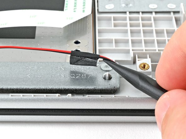 HP 15-fc0000 Series Speakers Replacement, Lift the speaker wire tape: crwdns2935265:015crwdnd2935265:02crwdnd2935265:02crwdne2935265:0