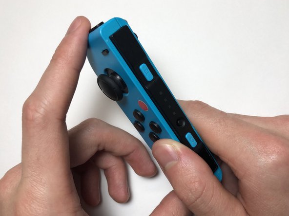 Left Joy-Con Charging Rail Replacement: crwdns2935265:016crwdnd2935265:02crwdnd2935265:03crwdne2935265:0