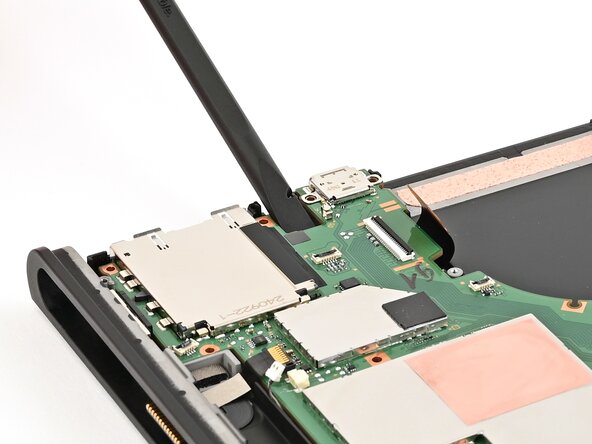 Nintendo Switch 2 Board Replacement, Lift the board: crwdns2935265:059crwdnd2935265:01crwdnd2935265:02crwdne2935265:0