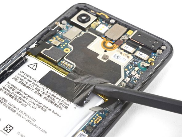 Google Pixel 3 Motherboard Replacement, Peel the black tape away from the battery: step 32, image 2 of 3