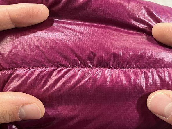 Release a Snagged Stitch on an Insulated Jacket, Quality control: crwdns2935265:04crwdnd2935265:02crwdnd2935265:03crwdne2935265:0