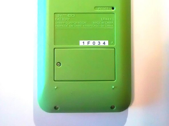 Sharp EL-531X Battery Replacement, Step 8: Reassemble the battery door: crwdns2935265:08crwdnd2935265:03crwdnd2935265:03crwdne2935265:0