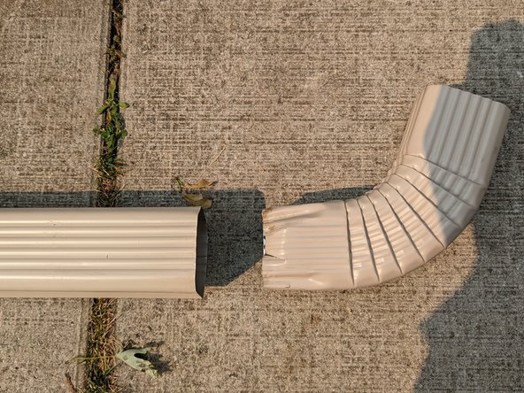How to Replace a Damaged Gutter Segment: step 4, image 2 of 3