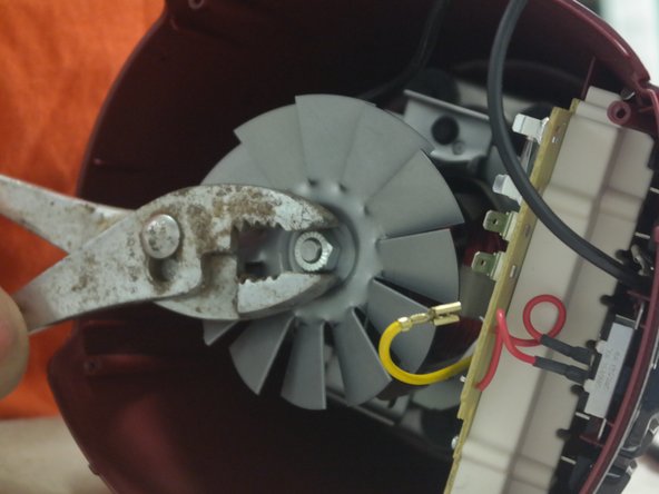 Oster 12 Speed Classic Series Blender Motor Replacement, Remove Fan Blade and Spindle: step 3, image 2 of 3