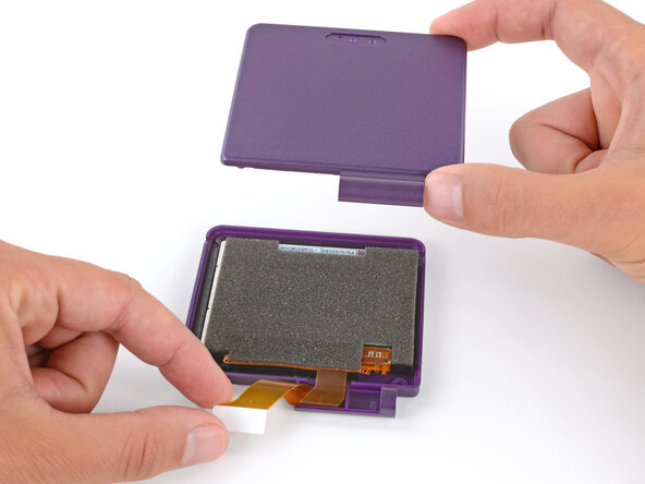 How to Reshell Your Game Boy Advance SP, Install the exterior shell: crwdns2935265:038crwdnd2935265:01crwdnd2935265:02crwdne2935265:0