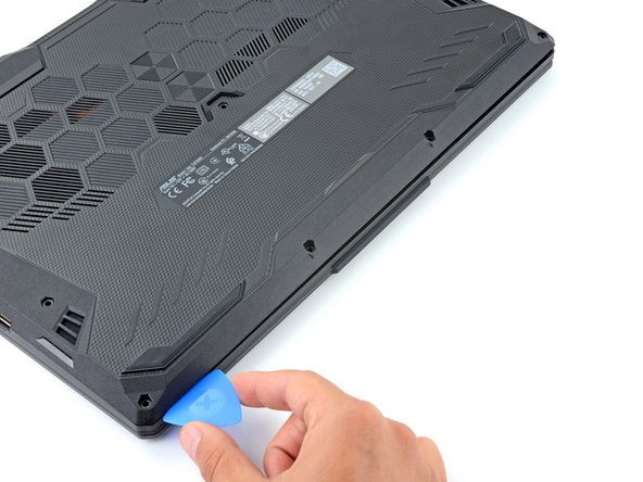 ASUS TUF Gaming F15 FX506HEB-DB74 Left SSD Replacement, Release the remaining clips: crwdns2935265:04crwdnd2935265:03crwdnd2935265:03crwdne2935265:0