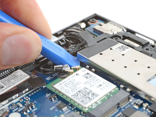 HP EliteBook 840 G9 SSD Replacement, Pry up the SSD shield: crwdns2935265:09crwdnd2935265:03crwdnd2935265:03crwdne2935265:0