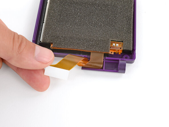 How to Reshell Your Game Boy Advance SP, Loop the screen cable: crwdns2935265:037crwdnd2935265:01crwdnd2935265:01crwdne2935265:0