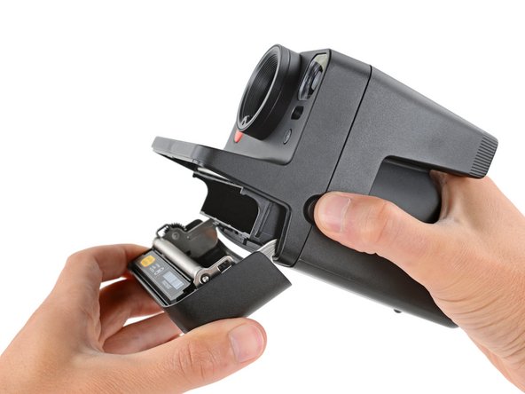 Polaroid Now Gen 3 Rear Shell Replacement, Open the film door: crwdns2935265:02crwdnd2935265:03crwdnd2935265:03crwdne2935265:0