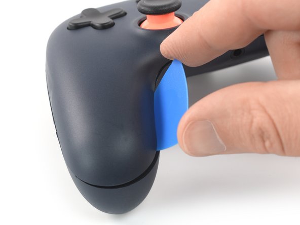 Google Stadia Controller Battery Replacement, Insert an opening pick: step 7, image 2 of 2