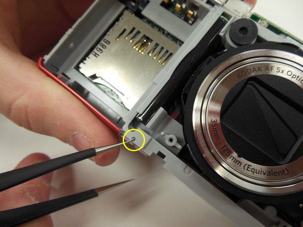 Kodak EasyShare M381 Battery Latch Replacement: crwdns2935265:014crwdnd2935265:03crwdnd2935265:03crwdne2935265:0