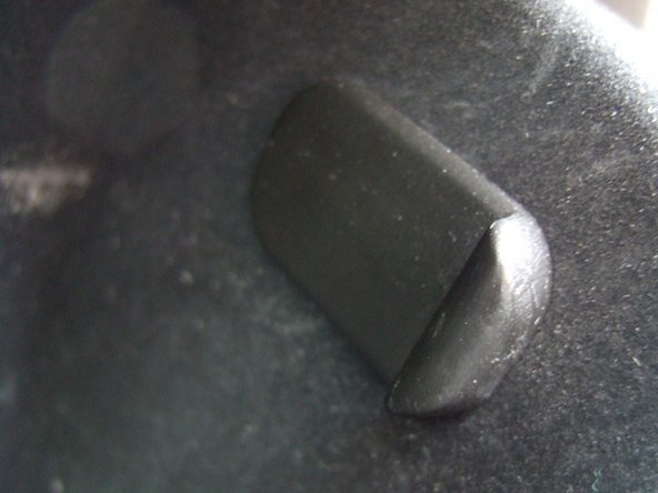 The flanges of the stopper arms should rest flat against the inside wall of the glove box. If they do not rest flat, you have not slid the stops up all the way in the holes.