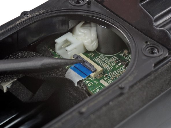 JBL Flip 5 Battery Replacement, Unlatch the power button cable ZIF connector: crwdns2935265:017crwdnd2935265:02crwdnd2935265:02crwdne2935265:0