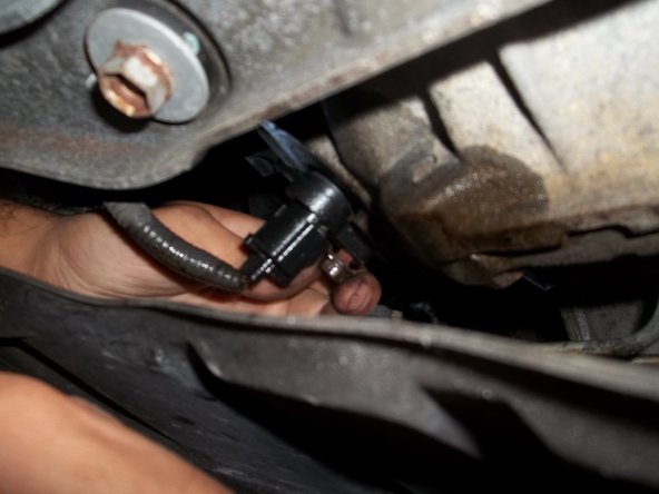 2003-2004 Infiniti G35 Sedan Crankshaft Position Sensor Replacement, Remove Bolt on Crankshaft Position Sensor: crwdns2935265:012crwdnd2935265:03crwdnd2935265:03crwdne2935265:0